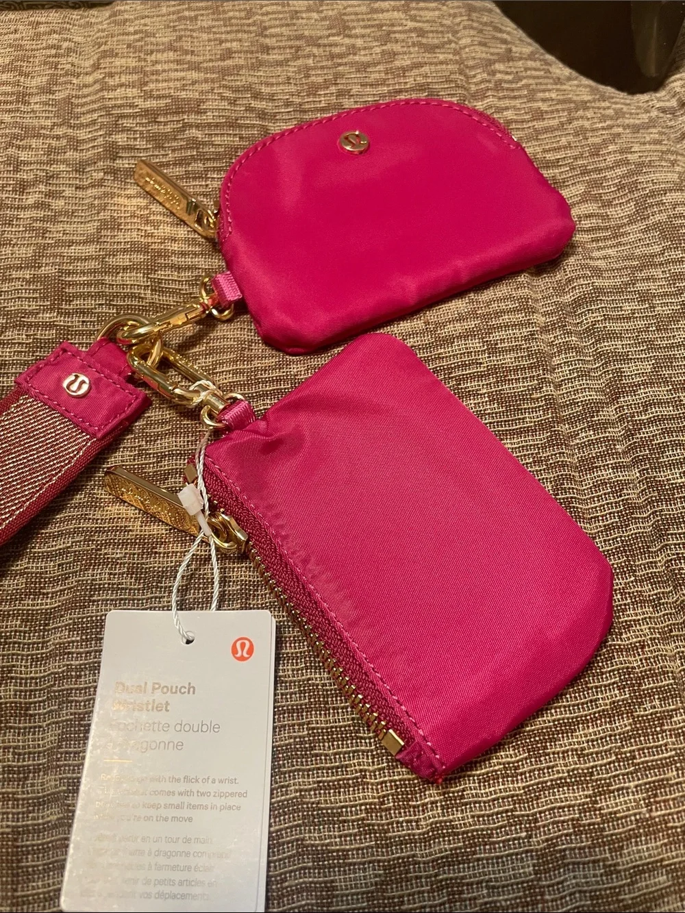 lululemon athletica pink dual pouch wristlet with logo strap